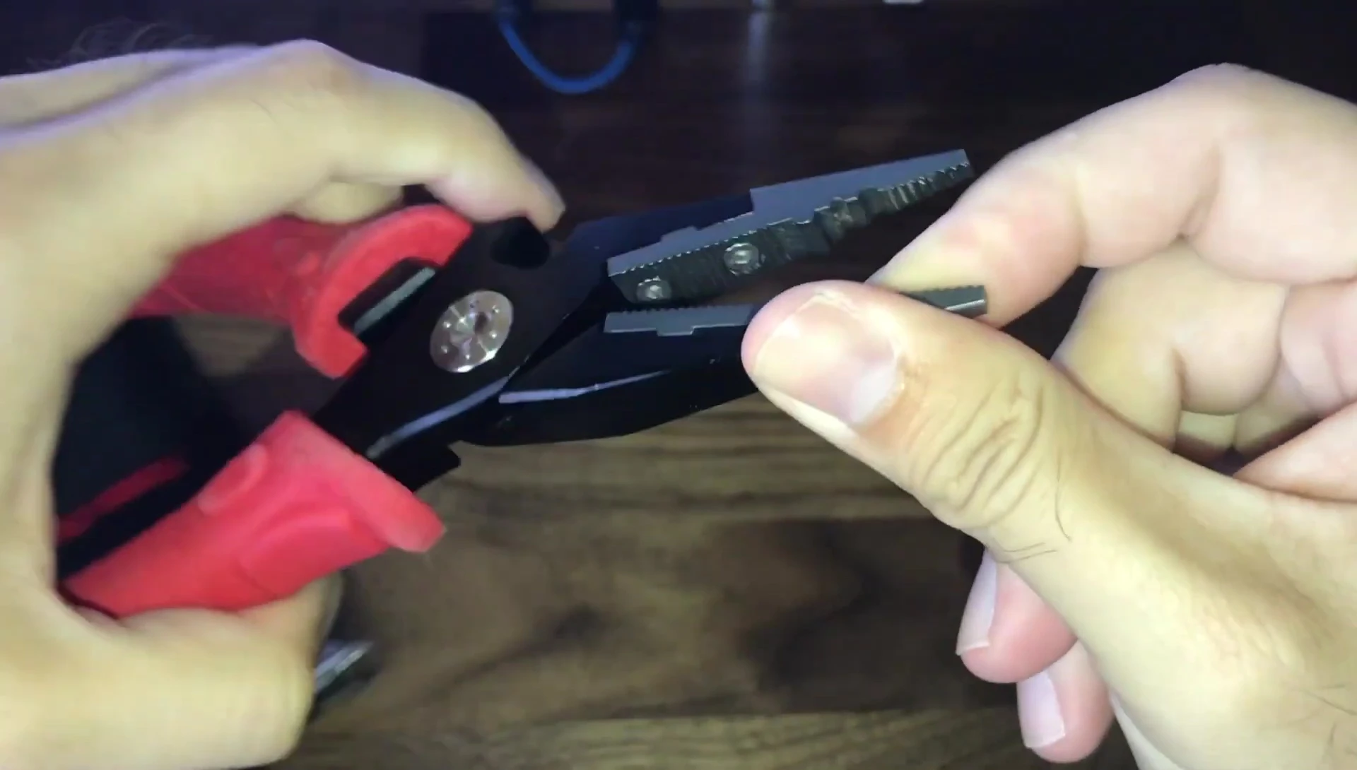 Close-up of the pliers' jaws, highlighting their condition after use.