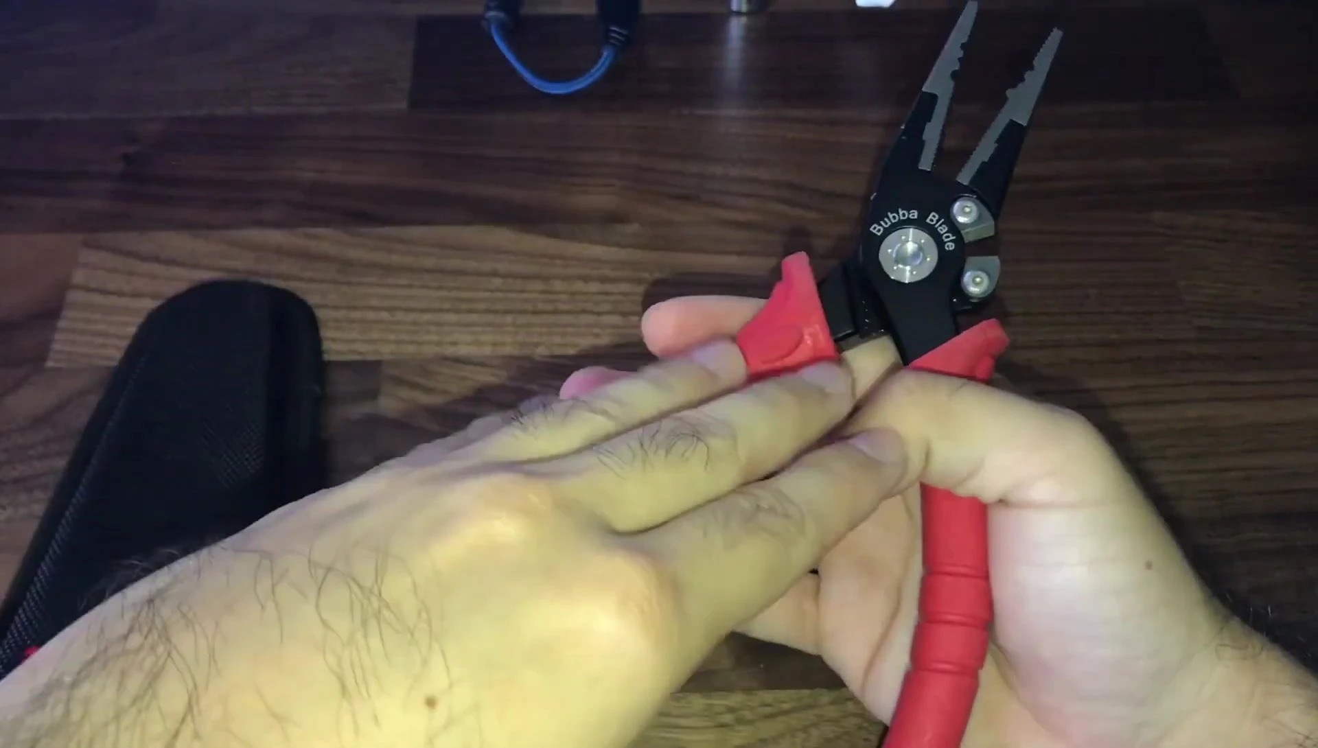 Shot emphasizing the lightweight nature of the pliers.