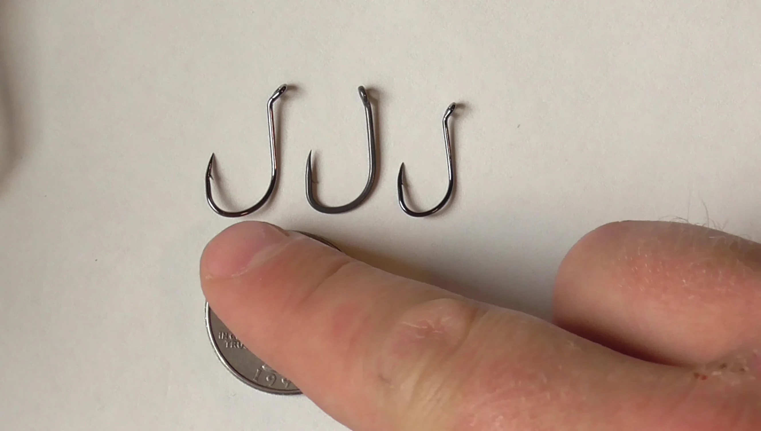 Comparison of size 4 Laser Sharp, size 6 Gamakatsu, and size 6 Laser Sharp hooks.