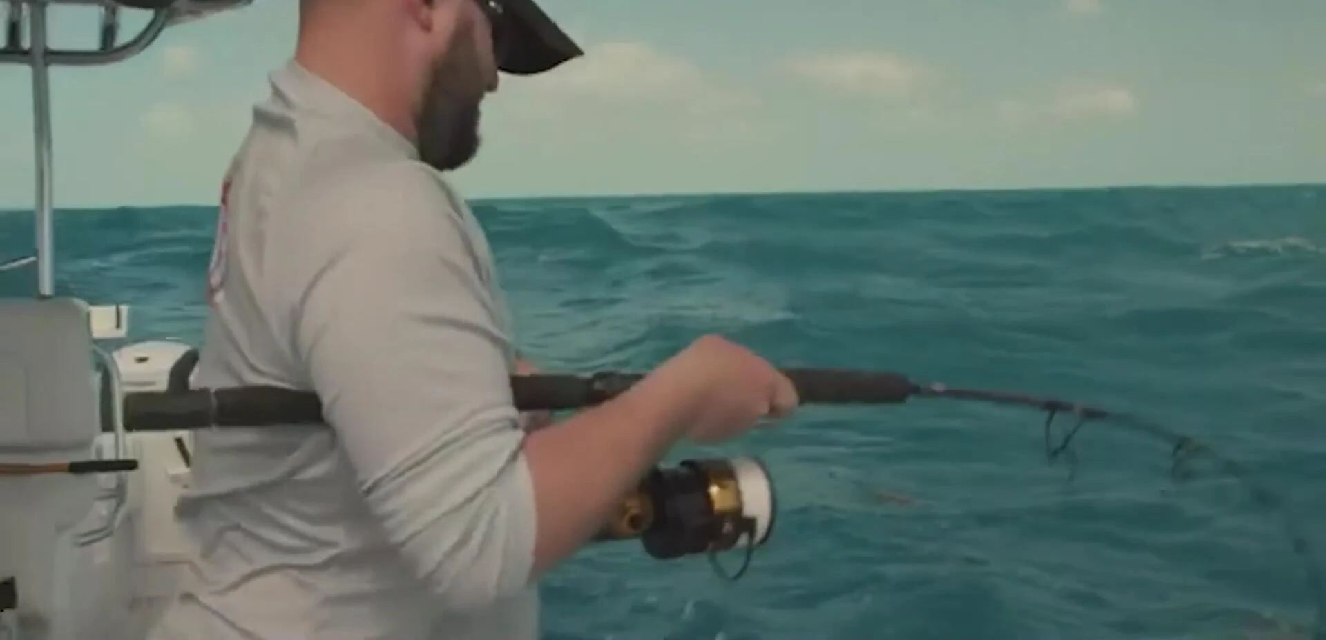 Angler using the Penn Spinfisher V reel