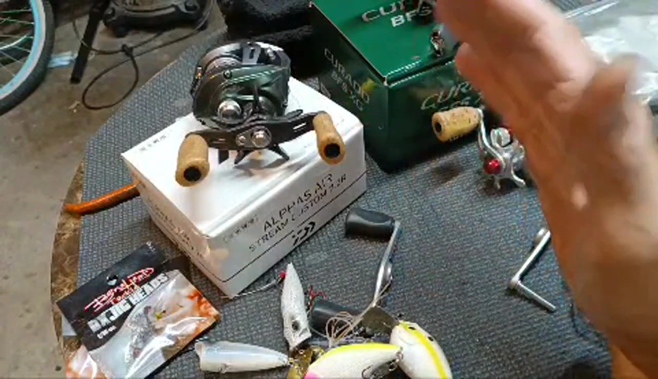 Close-up of the speaker holding the Silver Creek reel.