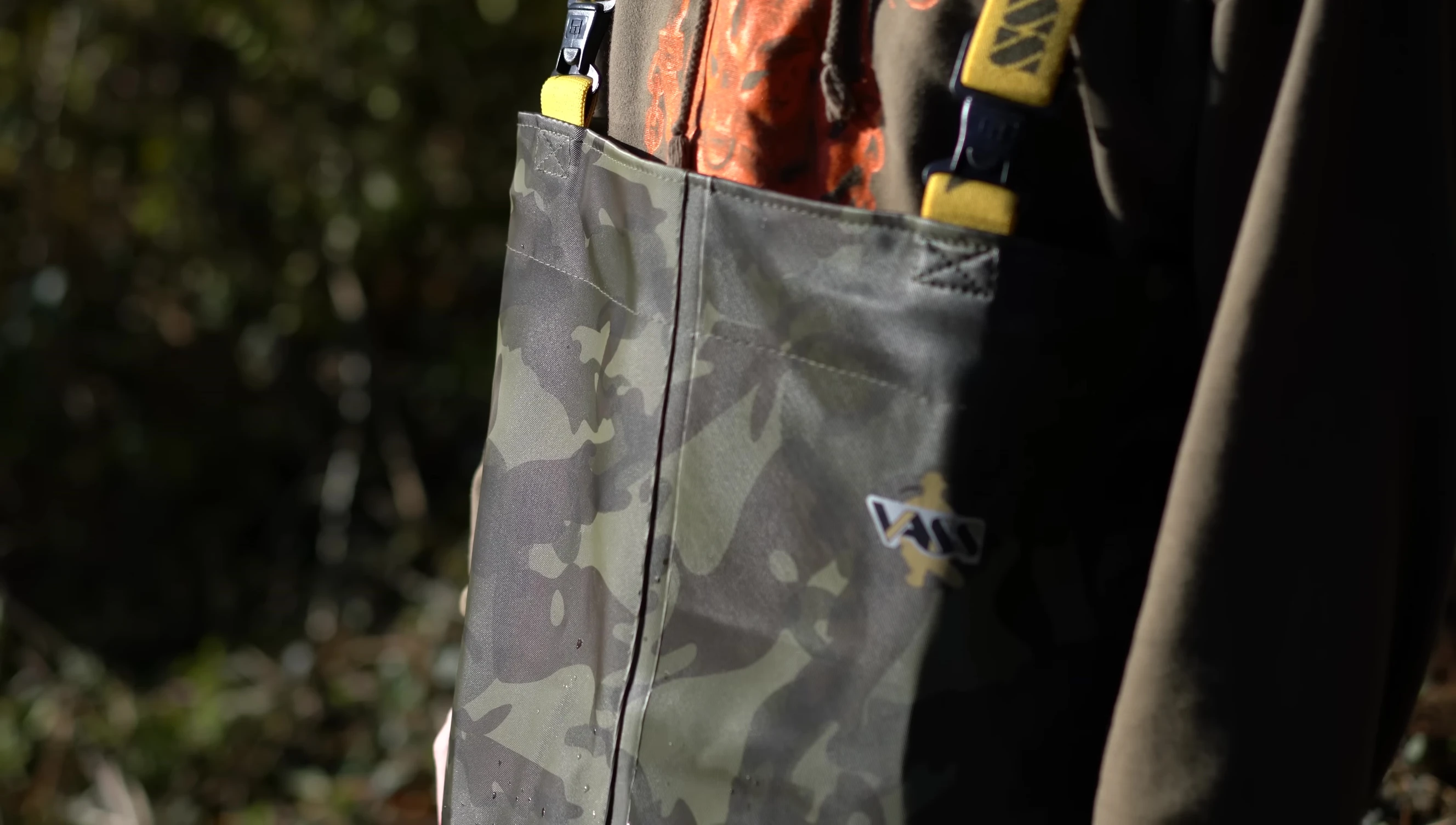 Detailed view of the wader's seams and features.