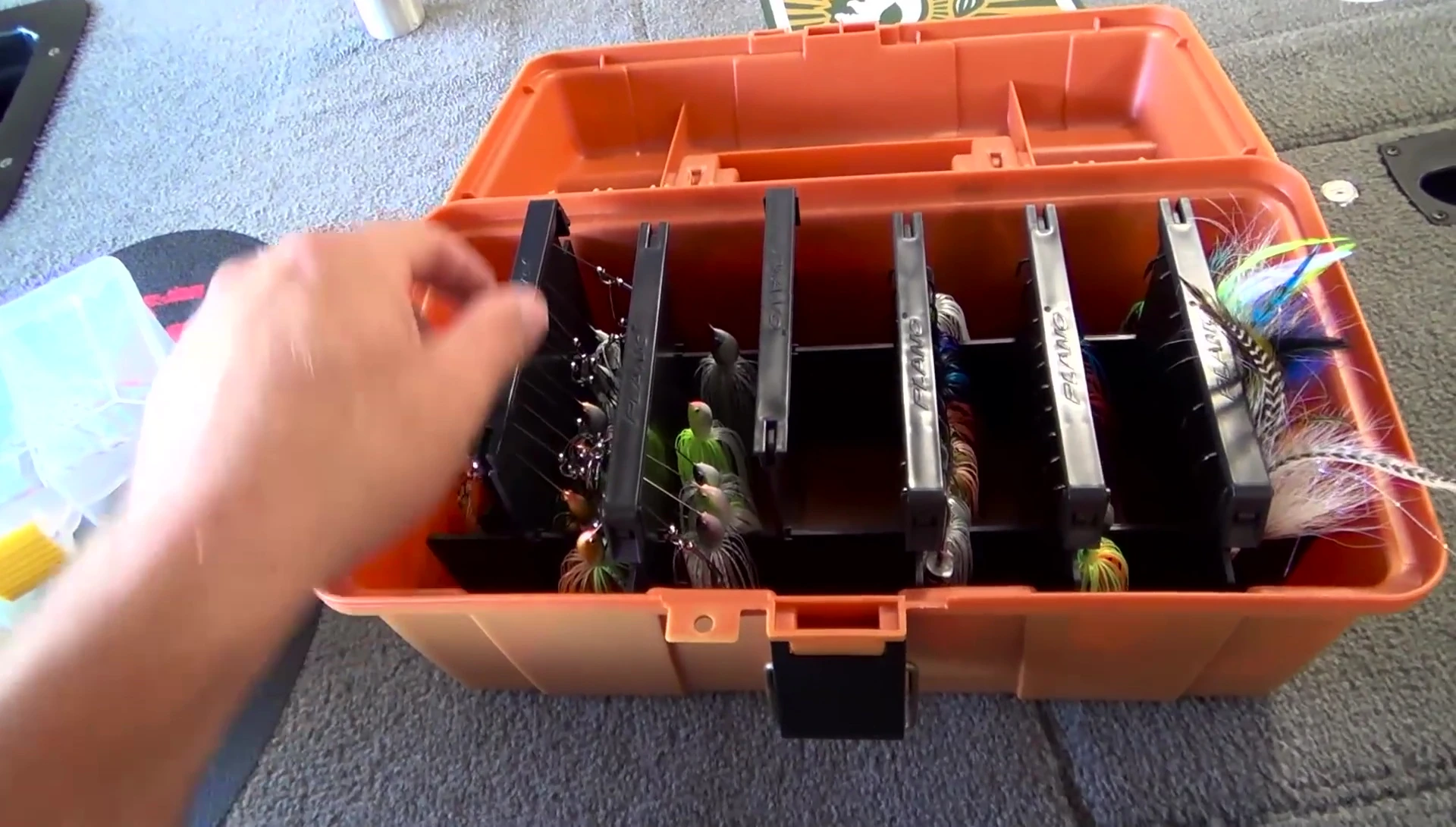 Close-up shot of spinnerbaits neatly organized within the dividers