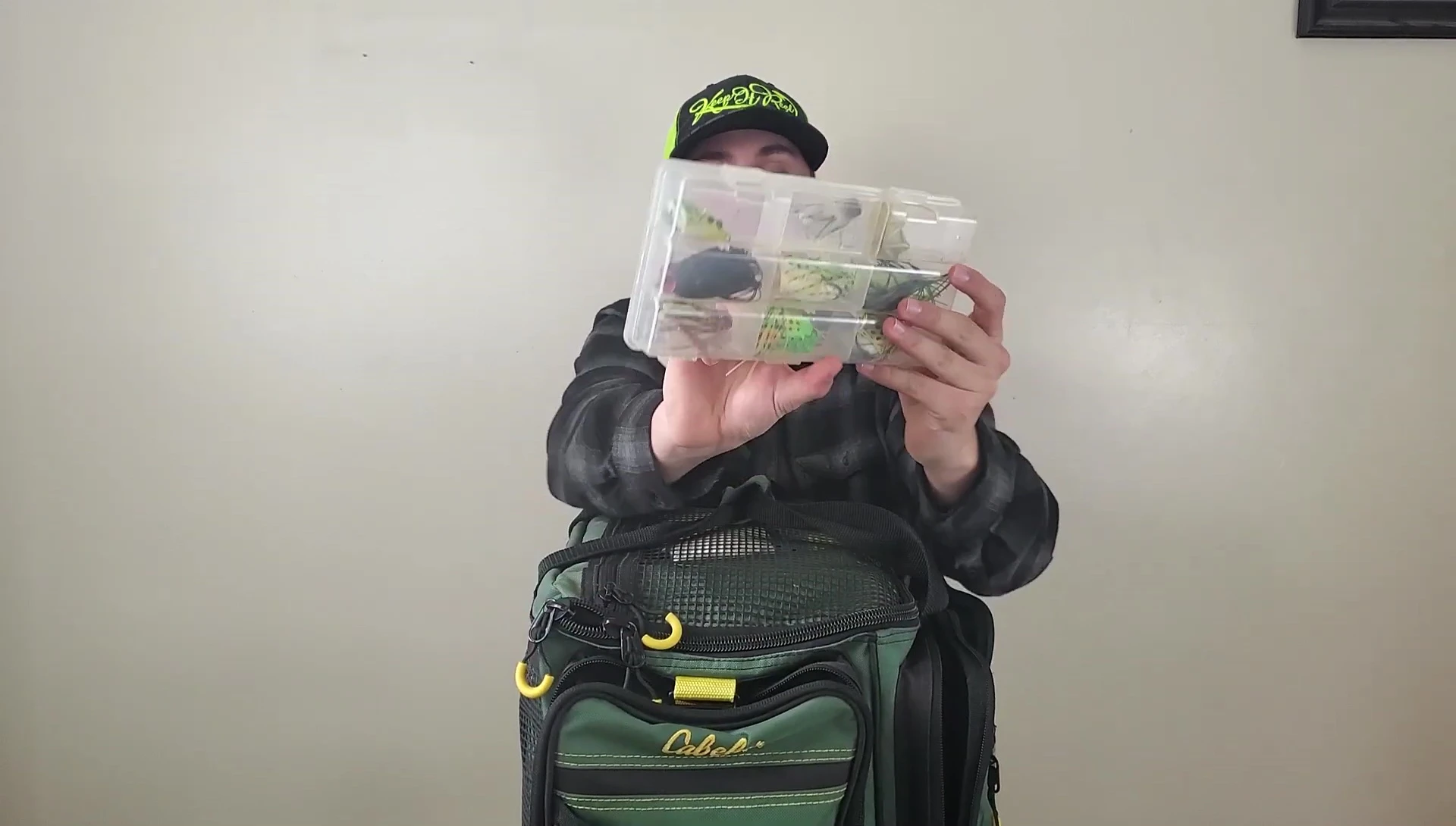 Tackle box filled with soft plastic frogs.