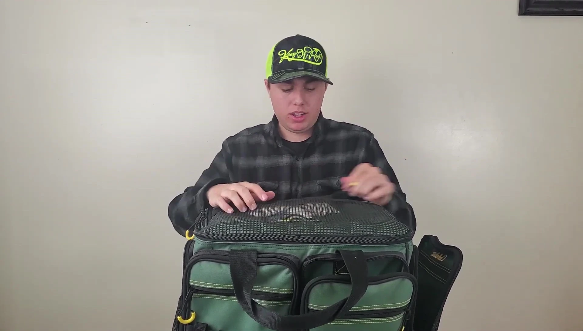 Cleaning rag and hooks in the top compartment.