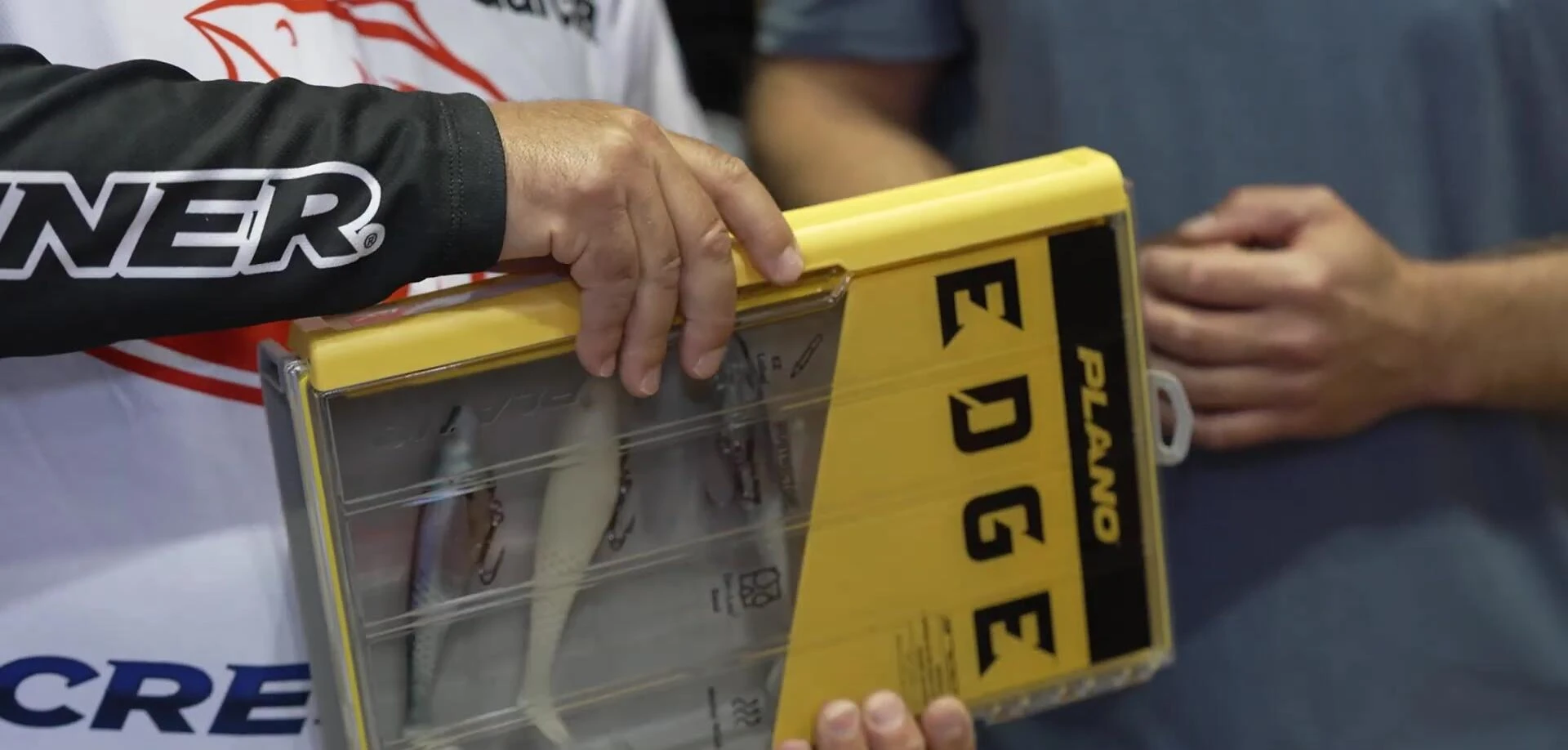 Close-up of swimbaits neatly stored in the box