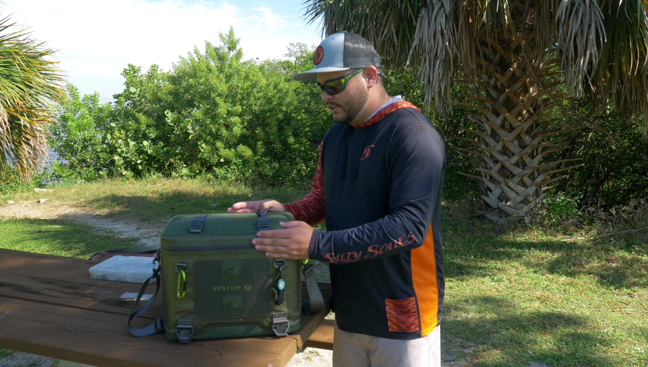 The slightly recessed lid of the tackle box.