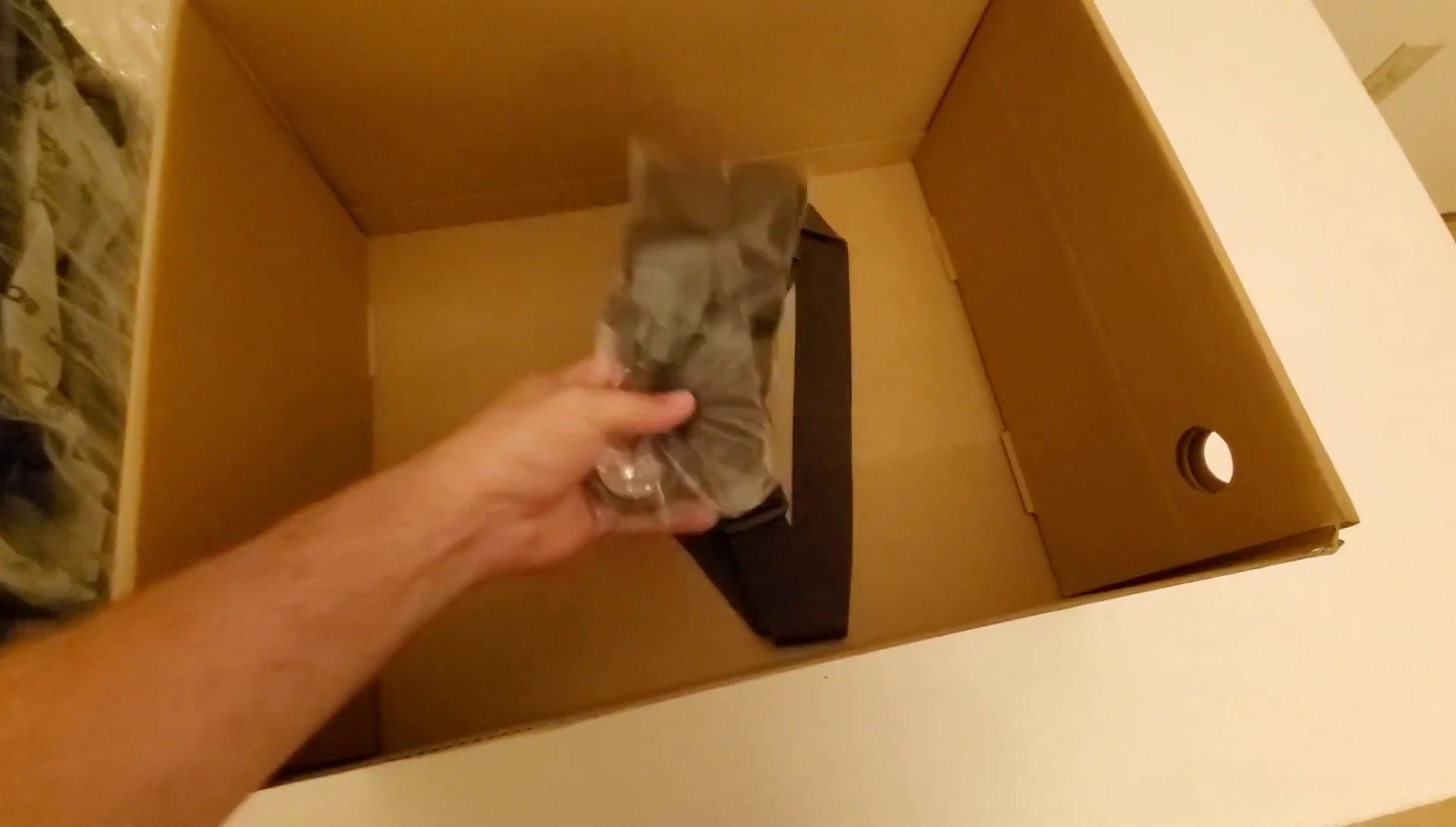 The extra belt and boot holder are shown.